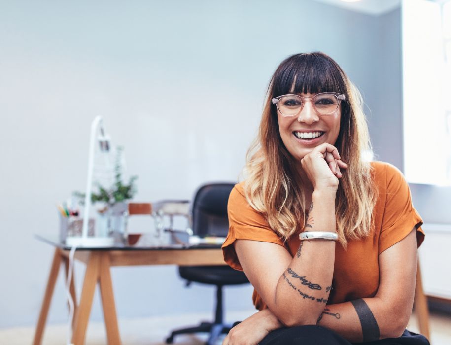 Woman smiling while in her office